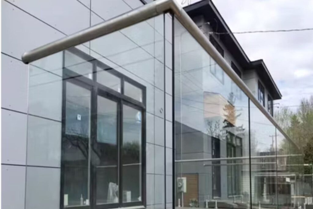 This image has a glass balcony railing in Huntsville