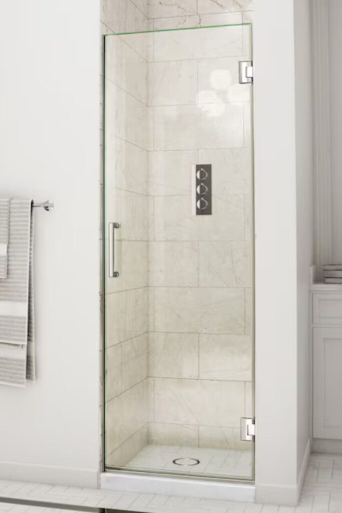 This image has glass shower door in Concord